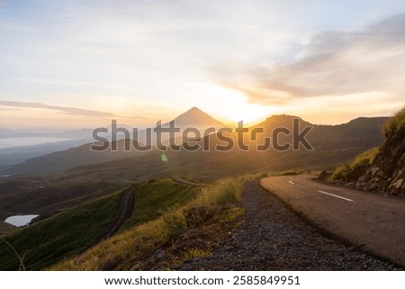 Similar – Image, Stock Photo Misty sunrise over winding road in La Mancha, Spain