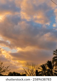Breathtaking Sunset with Dramatic Clouds Over Scenic Horizon
