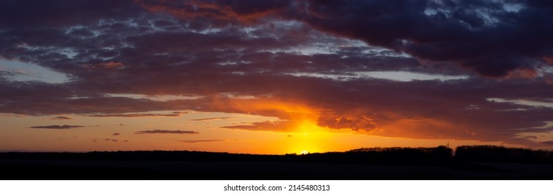 Breathtaking sunset with dramatic sky and clouds.