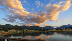 Breathtaking Sunset View In Late Summer.  Estes Lake, Rocky Mountain National Park, Colorado, USA.  Reflection In Water Of Colorful Clouds, Blue Sky And Mountains. 
