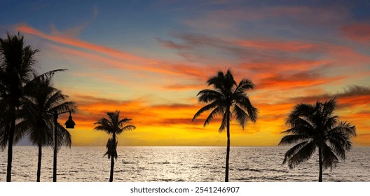 A breathtaking tropical sunset over the ocean, with vibrant hues of orange, yellow, and pink blending into the twilight sky. Silhouetted palm trees stand gracefully along the shoreline - Powered by Shutterstock