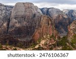 A breathtaking view of Angels Landing and canyon in Zion National Park, Utah, showcasing the stunning sandstone cliffs and lush greenery from an elevated perspective - USA