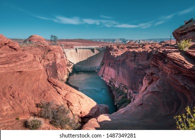 Breathtaking view during sunset of Colorado river in Glen Canyon Dam, a concrete arch-gravity dam, built for control floods, provide irrigation water and produce hydroelectric power in Arizona, USA - Powered by Shutterstock