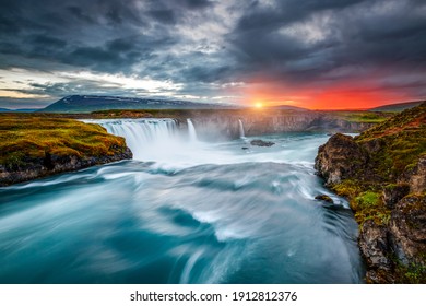 Breathtaking view of the grand Godafoss cascade. Location place Bardardalur valley, Skjalfandafljot river, Iceland, Europe. Image of most popular world landmarks. Discover the world of beauty.