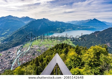 Breathtaking view from Harder Kulm of lake Thun, interlaken and the swiss alps, Switzerland.