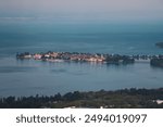 Breathtaking view of Lake Constance, with its clear waters reflecting the surrounding Alpine peaks. 