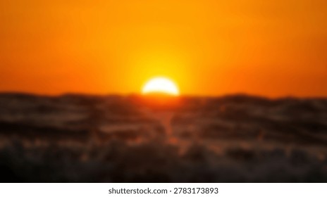 A breathtaking view of a sunset over the ocean. The sky is filled with vibrant orange hues, creating a beautiful and serene atmosphere. The sun is setting on the horizon.