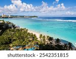 Breathtaking View of Tumon Bay with Clear Blue Waters and Palm Trees in Guam