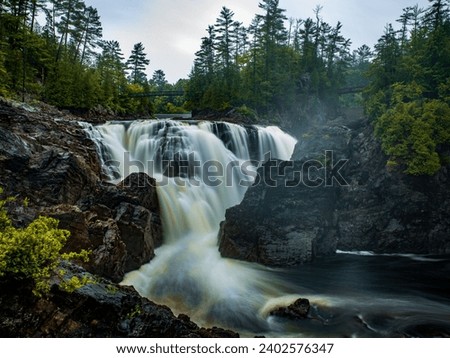 A breathtaking view of a waterfall in Chutes Coulonge Park in Canada, long exposure
