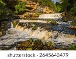 Breathtaking view of Willow Falls, a famous landmark at Willow River State Park,