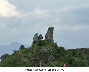 Breathtaking views of the Scottish Highlands unfold with rolling green hills, rugged mountains, and tranquil lochs. Misty skies and vibrant wildflowers create a stunning natural tapestry of beauty. - Powered by Shutterstock