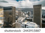 A breathtaking vista unfolds showcasing the urban skyline of Cape Town, South Africa, with the majestic Table Mountain looming in the background