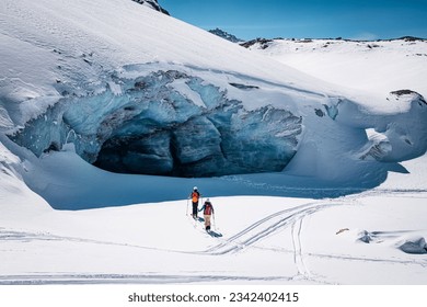 A breathtaking winter scene featuring adventurers in Italy's Val Senales, South Tyrol