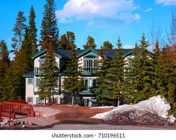 BRECKENRIDGE, COLORADO/USA - April 16, 2017: Melting Snow In Front Of A Vintage House On A Sunny Day