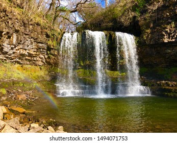 Brecon Beacons Waterfall With Rainbow Reflection