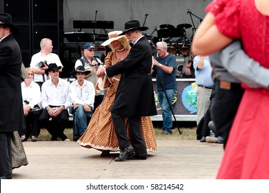 BREDENE , BELGIUM - JULY 31: Participants In The Country & Western Sing/dance Weekend Wear Traditional Western Outfits July 31, 2010 In Bredene , Belgium