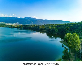 Breeding of freshwater fish in lake with round nets. Rhodope mountains, Europe - Shutterstock ID 2231419289
