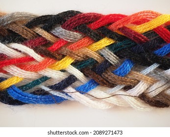 Breided thread plait with many different colours useful as a background
