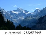 Breithorn and Tschingelhorn mountain peaks above the Lauterbrunnen valley in the Bernese Alps, viewed from Wengen, Switzerland