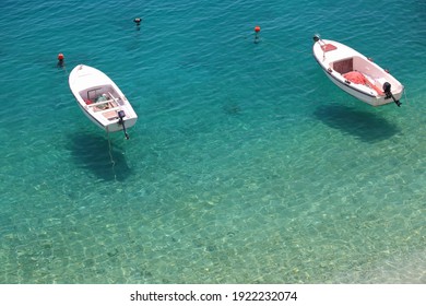 Brela, Croatia. Adriatic Sea nature. Podrace beach levitating boats.