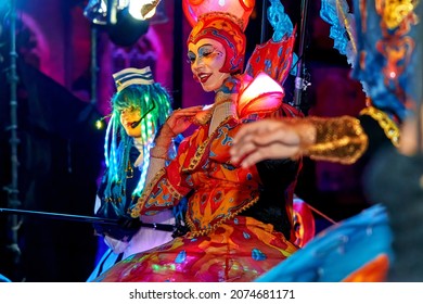 Bremen, Germany - November 06, 2021: young woman with beautiful colorful carnival dress during the event "Das große Lichtertreiben"