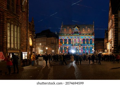 Bremen, Germany - November 06, 2021: beautifully illuminated historic building called "Schütting" during the event "Das große Lichtertreiben"