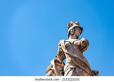 Brescia. Closeup of the marble statue and fountain of Brescia Armata (Brescia Armed) by the Italian sculptor Antonio Calegari (1699-1777). Square Piazza Paolo VI or Piazza del Duomo. Lombardy, Italy.