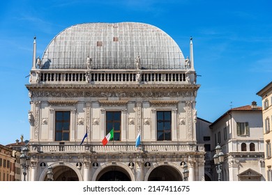 Brescia downtown. Ancient Loggia Palace (Palazzo della Loggia) in Renaissance Style, 1492-1574, in Loggia town square (Piazza della Loggia). Lombardy, Italy, Southern Europe.