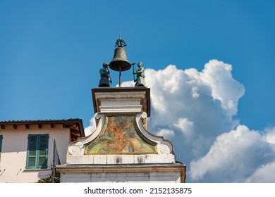 Brescia downtown. Clock and bell tower in Renaissance style, 1540-1550, in Loggia town square (Piazza della Loggia). Lombardy, Italy, Europe. Bronze bell and two statues with hammer, two automata.