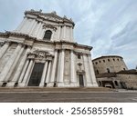 Brescia downtown. Old and new Cathedral of Santa Maria Assunta (Duomo Vecchio and Duomo Nuovo) in Romanesque and late Baroque style, Cathedral square or Paolo VI square. Lombardy, Italy, Europe.