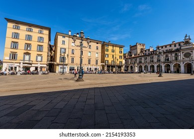 BRESCIA, ITALY - APR 17, 2022: Brescia downtown. The Loggia town square in Brescia downtown (Piazza della Loggia) with the clock and bell tower in Renaissance style, 1540-1550, Lombardy, Italy, Europe