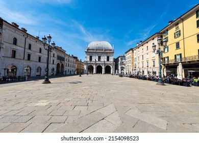 BRESCIA, ITALY - APRIL 17, 2022: Brescia downtown. Ancient Loggia Palace (Palazzo della Loggia) in Renaissance Style, 1492-1574, in Loggia town square (Piazza della Loggia). Lombardy, Italy, Europe.