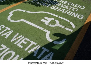 Brescia, Italy: Car sharing parking area with electric charging station. 