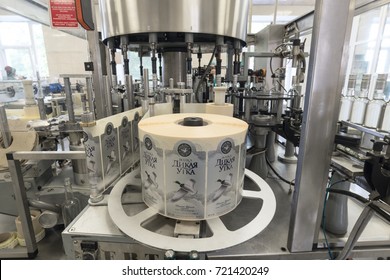 Brest, Belarus - July 05, 2017: Brest Distillery. A machine for applying labels to bottles