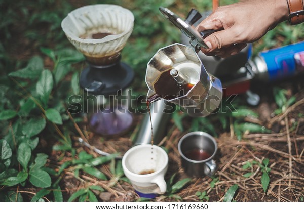 Brew coffee in nature using special equipment