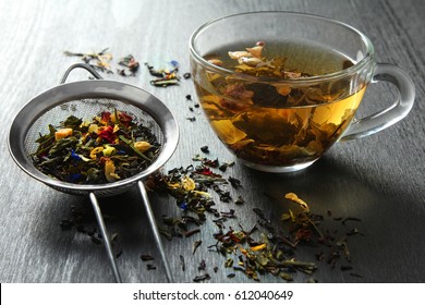 Brewed Delicious Herbal Tea On A Wooden Black Background