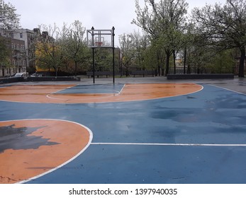 Brewer Park Basketball Court In Crown Heights Close To The Brooklyn Children's Museum On A Rainy Afternoon. Brooklyn New York April 24 2019