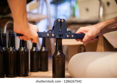 Brewing Beer At Home - Make Your Own Ale. Capping The Bottles