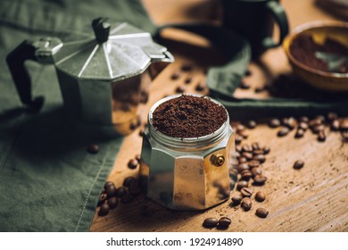 Brewing coffee with Moka pot. Moka pot is a coffee maker. - Powered by Shutterstock