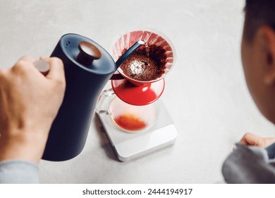 Brewing Perfect Cup: Pour Over Coffee Preparation With V60 Funnel on Kitchen Counter - Powered by Shutterstock