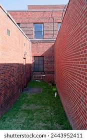 Brick alley way between buildings