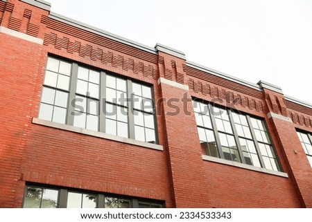 brick building business complex represents solid foundations and success in commerce. Impressive architecture capturing ambition and stability in modern century entrepreneurship