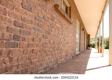 Brick Building Under Veranda In Australia. 