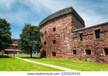 The brick exterior of Castle Williams on Governors island national park in lower manhattan in New York City.  
