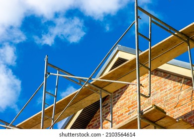 Brick House Roof Peak Under Construction Roof Wood Scaffolding Blue Sky Sunny Day