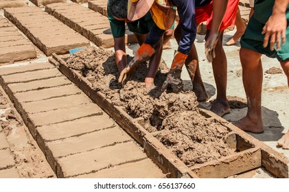 Brick made from clay mixed with rice husk. - Shutterstock ID 656137660