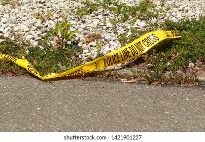 Brick , New Jersey /USA 06/11/19 Police Lines Do Not Cross Caution Tape Covering Crime Scenes