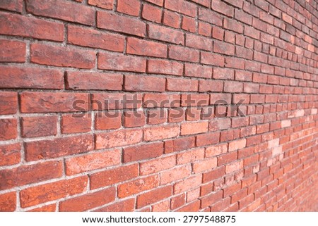 Brick on wall background. Brick in redbrick texture. Brick on masonry surface. Brick rustic backdrop.
