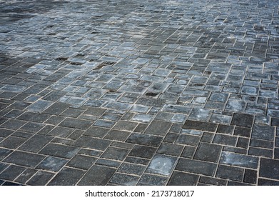 Brick Path Or Sidewalk With Perspective Going Into The Distance With Soft Sunlight Reflecting Of The Bricks.