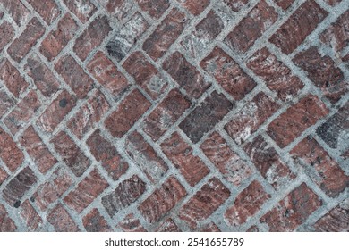 Brick paver close up - background texture of a brick pathway - herringbone or rows - Powered by Shutterstock